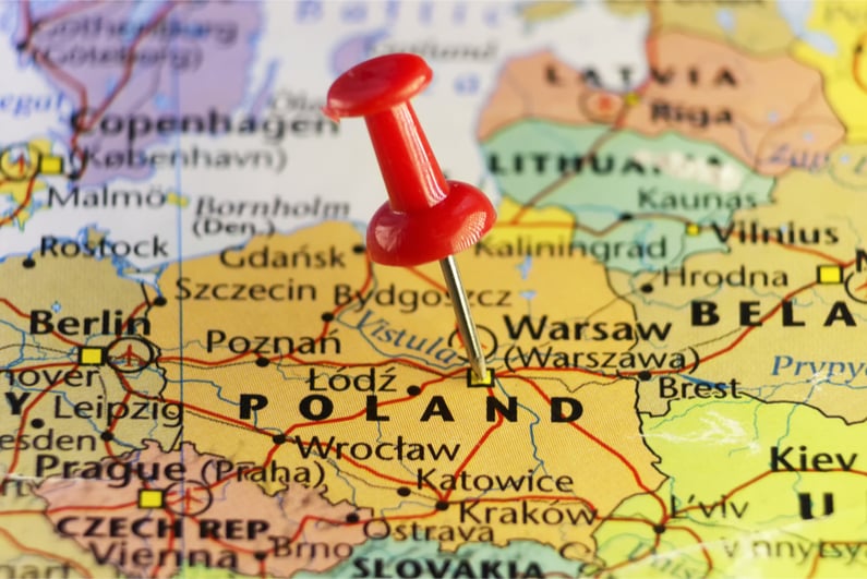 A pin marks the location of Warsaw, Poland's capital