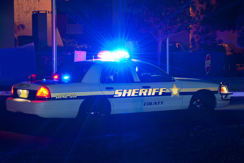 Sheriff cruiser car with lights on