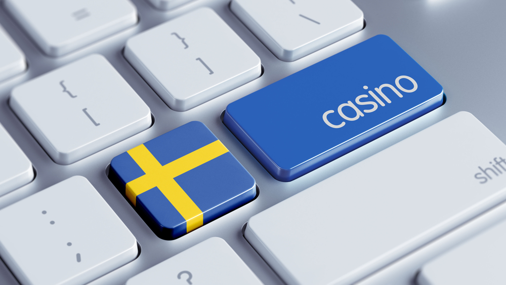 key with swedish flag and another with the word "casino"on keyboard